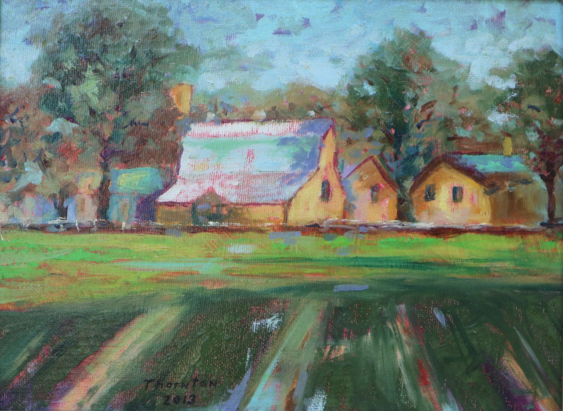Original oil painting of yellow farm buildings along a tree-lined lane by Joel Thornton